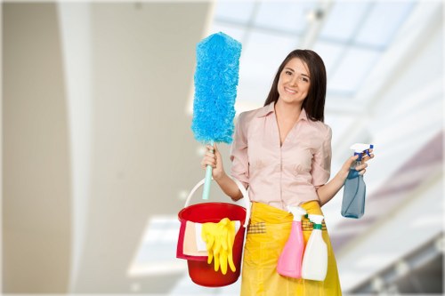 Cleaner working in a W8 office reception area