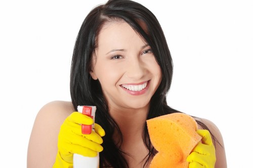 Deep cleaning kitchen and bathroom areas during a move-out clean in W8