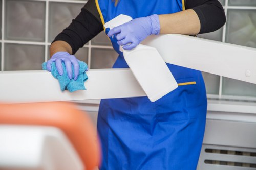 Technician treating a carpet stain during a local cleaning appointment